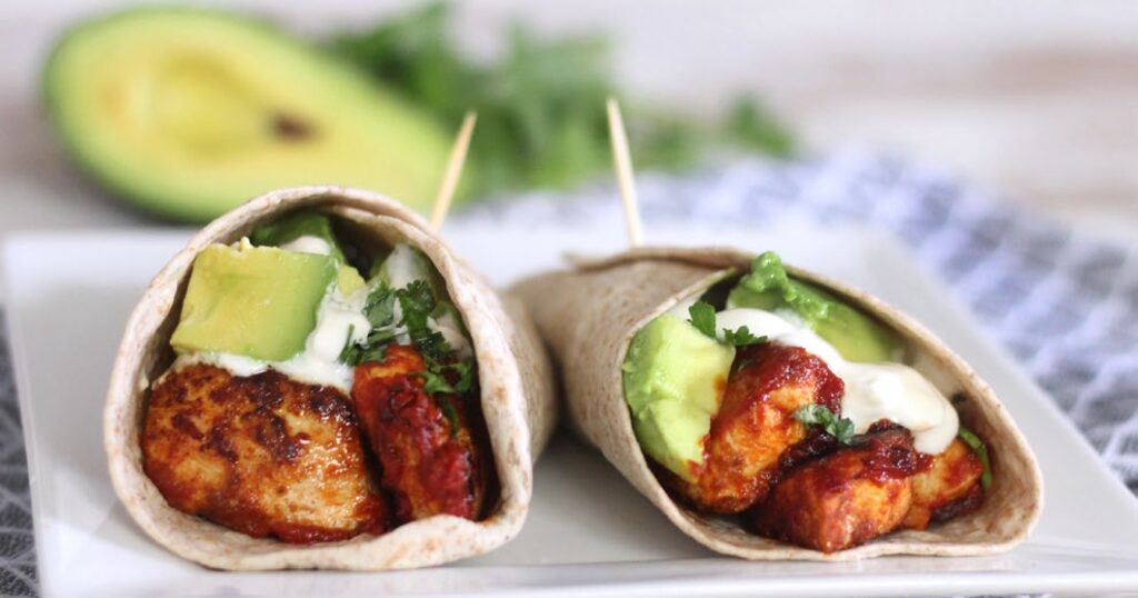 High-protein chicken taco wrap with avocado and fresh coriander
